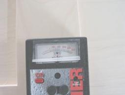 Checking moisture content of door